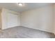 Bedroom featuring a closet with sliding doors and neutral wall and carpet colors at 8684 Captain Dr, Avon, IN 46123