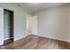 The bedroom features hard wood floors, a closet, and neutral paint at 8684 Captain Dr, Avon, IN 46123