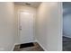 Bright and neutral home foyer featuring hardwood floors and fresh paint at 8684 Captain Dr, Avon, IN 46123