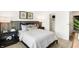 Serene bedroom featuring stylish decor, a comfortable bed, and ambient lighting at 8684 Marietta Ln, McCordsville, IN 46055
