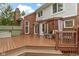 Back deck includes an outdoor dining area and curtained outdoor seating area at 8723 Bergeson Dr, Indianapolis, IN 46278