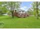 Large backyard with a wooden deck perfect for outdoor entertaining at 8723 Bergeson Dr, Indianapolis, IN 46278