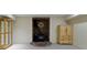 Finished basement featuring a cozy wood stove fireplace with decorative brick surround at 8723 Bergeson Dr, Indianapolis, IN 46278