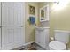Traditional bathroom with a neutral color palette, white vanity, and coordinated fixtures at 8723 Bergeson Dr, Indianapolis, IN 46278