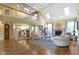 Bright and airy living room with a vaulted ceiling, a fireplace, and hardwood floors at 8723 Bergeson Dr, Indianapolis, IN 46278