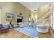 Spacious living room featuring hardwood floors, high ceilings and a staircase to the upper level at 8723 Bergeson Dr, Indianapolis, IN 46278