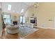Bright and airy living room with a vaulted ceiling, a fireplace, and hardwood floors at 8723 Bergeson Dr, Indianapolis, IN 46278