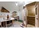 Relaxing sauna room with a dry sauna, seating, and table area at 8723 Bergeson Dr, Indianapolis, IN 46278