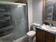 Bathroom showcasing a glass-enclosed shower, vanity with sink, and modern fixtures at 8810 Summer Walk E Dr, Indianapolis, IN 46227