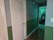 Hallway featuring two-tone walls and doors leading to other rooms at 8810 Summer Walk E Dr, Indianapolis, IN 46227