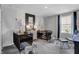 Charming Bedroom featuring two cribs, soft lighting, and playful decor at 8838 Alexander Ridge Dr, McCordsville, IN 46055