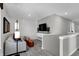 Inviting living room featuring gray walls, plush seating, a mounted TV, and stylish decorative accents at 8838 Alexander Ridge Dr, McCordsville, IN 46055