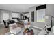 Open-concept area seamlessly connects living, dining, and kitchen spaces, creating a harmonious and inviting atmosphere at 8838 Alexander Ridge Dr, McCordsville, IN 46055