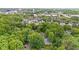 Idyllic neighborhood with tree-lined streets, charming homes, and convenient access to city amenities at 8934 Pinyon Ct, Indianapolis, IN 46260