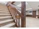 This basement features carpeted stairs and wood finishings at 8934 Pinyon Ct, Indianapolis, IN 46260