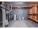 Unfinished basement with exposed utilities, shelving, and concrete floor at 8934 Pinyon Ct, Indianapolis, IN 46260