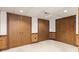 Basement storage area featuring several wooden closets with doors at 8934 Pinyon Ct, Indianapolis, IN 46260