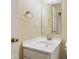 Bathroom featuring a single sink vanity with a toilet and mirror at 8934 Pinyon Ct, Indianapolis, IN 46260