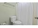 Bathroom showcasing a toilet and shower with simple fixtures at 8934 Pinyon Ct, Indianapolis, IN 46260