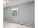 This bedroom features neutral walls, carpet, and a window at 8934 Pinyon Ct, Indianapolis, IN 46260