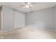 Bedroom featuring light-colored carpet and neutral walls with a closet at 8934 Pinyon Ct, Indianapolis, IN 46260