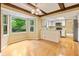 Living and kitchen area featuring hardwood floors, recessed lighting, and large windows at 8934 Pinyon Ct, Indianapolis, IN 46260