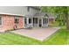 Spacious patio and screened-in porch offers the perfect setup for outdoor entertaining at 8934 Pinyon Ct, Indianapolis, IN 46260