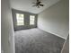 Bedroom with two windows and ceiling fan at 8939 Newchurch Blvd, Indianapolis, IN 46231