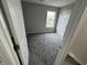Bedroom with one window and doorway at 8939 Newchurch Blvd, Indianapolis, IN 46231