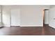 Spacious bedroom featuring wood floors, a closet, and neutral walls at 9206 Huntleigh Cir, Plainfield, IN 46168