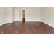 Bedroom boasts new wood floors, neutral walls, and an ensuite bathroom at 9206 Huntleigh Cir, Plainfield, IN 46168