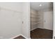 The laundry room has white walls and tile floors at 9206 Huntleigh Cir, Plainfield, IN 46168