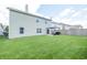 The expansive backyard offers ample space for outdoor activities, featuring a patio with a pergola for relaxation at 935 Northwich Ave, Westfield, IN 46074