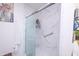 Bathroom featuring a glass door shower with marble-style walls and a convenient grab bar at 935 Northwich Ave, Westfield, IN 46074