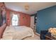 Bedroom featuring neutral carpet, brightly colored walls, and a large window dressed with patterned curtains at 935 Northwich Ave, Westfield, IN 46074