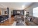 Comfortable living room featuring two sofas, a coffee table, and an open view to a dining area and kitchen at 935 Northwich Ave, Westfield, IN 46074