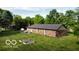 Aerial view of the property featuring a patio and a large yard at 9390 N State Road 39, Lizton, IN 46149