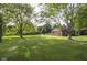Expansive and well maintained backyard with mature trees at 9390 N State Road 39, Lizton, IN 46149