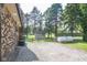 Spacious backyard area showing the shed, and gated access and mature trees at 9390 N State Road 39, Lizton, IN 46149