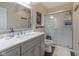 Bathroom boasts a vanity with marble countertop and glass-enclosed shower at 9390 N State Road 39, Lizton, IN 46149