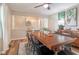 Inviting dining room with a large wooden table, stylish decor, and lots of natural light at 9390 N State Road 39, Lizton, IN 46149