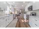Modern kitchen with white cabinets, stainless steel appliances, and sleek countertops at 9390 N State Road 39, Lizton, IN 46149