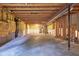 Spacious unfinished basement with exposed ceilings, concrete floor and ready for customization at 9705 Valley Springs Blvd, Fishers, IN 46037