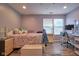 This is a cozy bedroom with light purple walls and wood floors at 9705 Valley Springs Blvd, Fishers, IN 46037