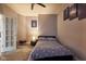 Cozy bedroom with a geometric patterned duvet cover, framed prints, and a unique area rug at 9705 Valley Springs Blvd, Fishers, IN 46037