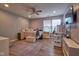 This bedroom has wood floors and a light purple wall. It is illuminated by natural light at 9705 Valley Springs Blvd, Fishers, IN 46037