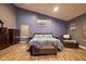 Spacious primary bedroom featuring vaulted ceilings and natural light streaming through windows at 9705 Valley Springs Blvd, Fishers, IN 46037