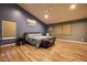 Spacious primary bedroom featuring vaulted ceilings and natural light streaming through windows at 9705 Valley Springs Blvd, Fishers, IN 46037