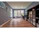 The living room has bright, natural light and wood floors with a storage unit at 9705 Valley Springs Blvd, Fishers, IN 46037