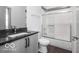 Stylish bathroom featuring a glass-enclosed shower and modern vanity at 1001 Harlan St, Indianapolis, IN 46203
